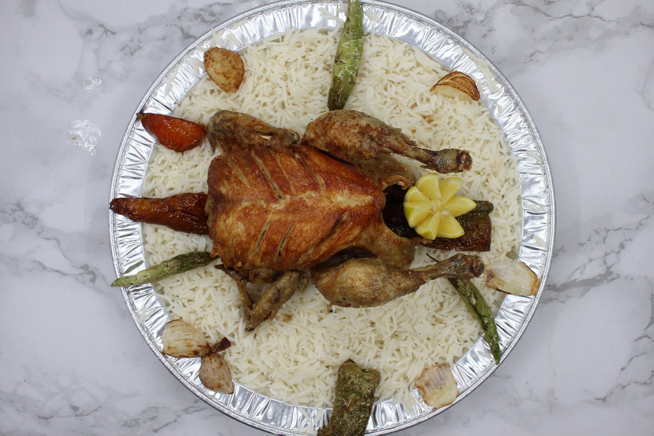 نصف حبة دجاج مقلي + نفر رز (1)