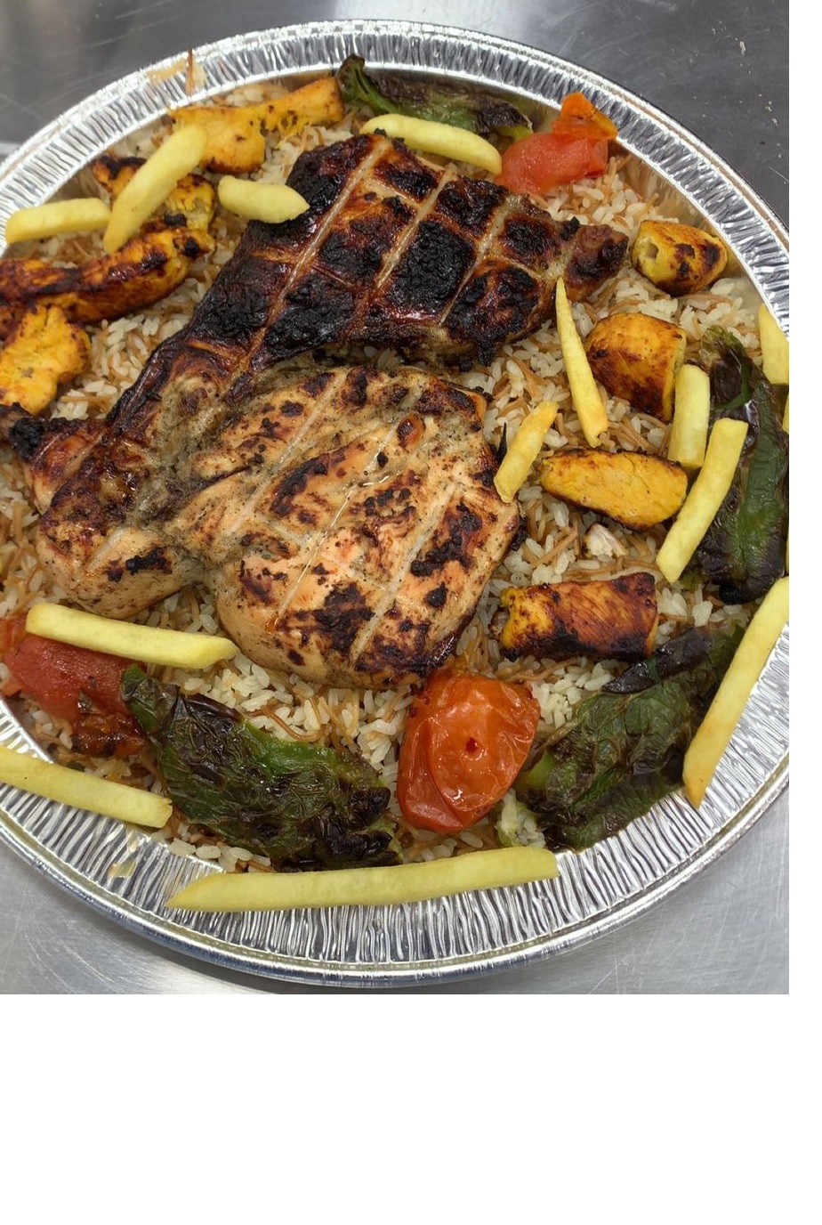 صينية بحبوح صغير نصف دجاجة بالرز + سيخ 1 شيش طاووق + ايدام  واحد