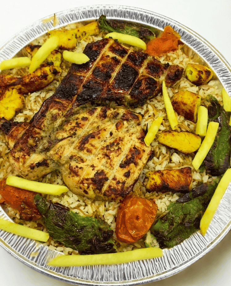 صينية بحبوح صغير نصف دجاجة بالرز + سيخ 1 شيش طاووق + ايدام  واحد